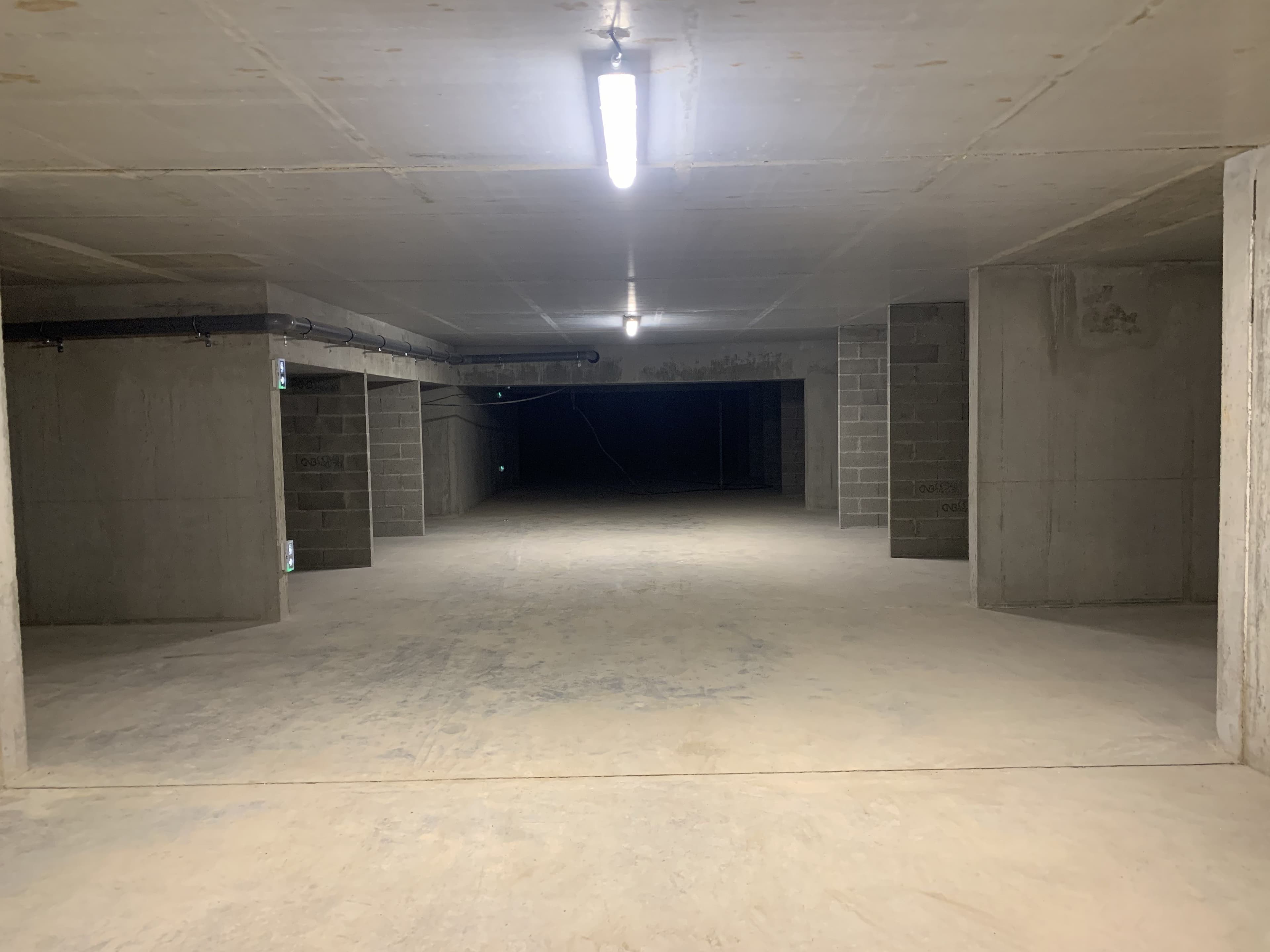 Garage 15.5 m2 sécurisé dans résidence neuve