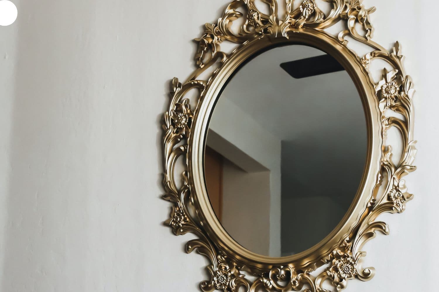 Miroir à cadre doré